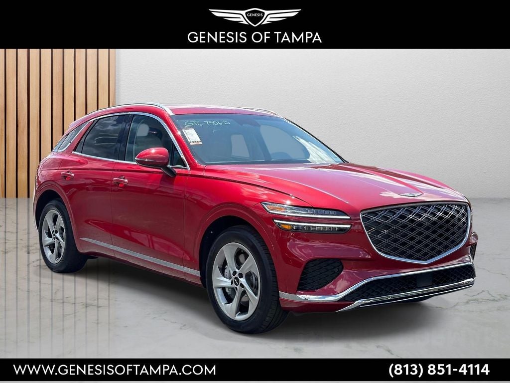 2026 Genesis GV70 2.5T in Mauna Red — front three-quarter view