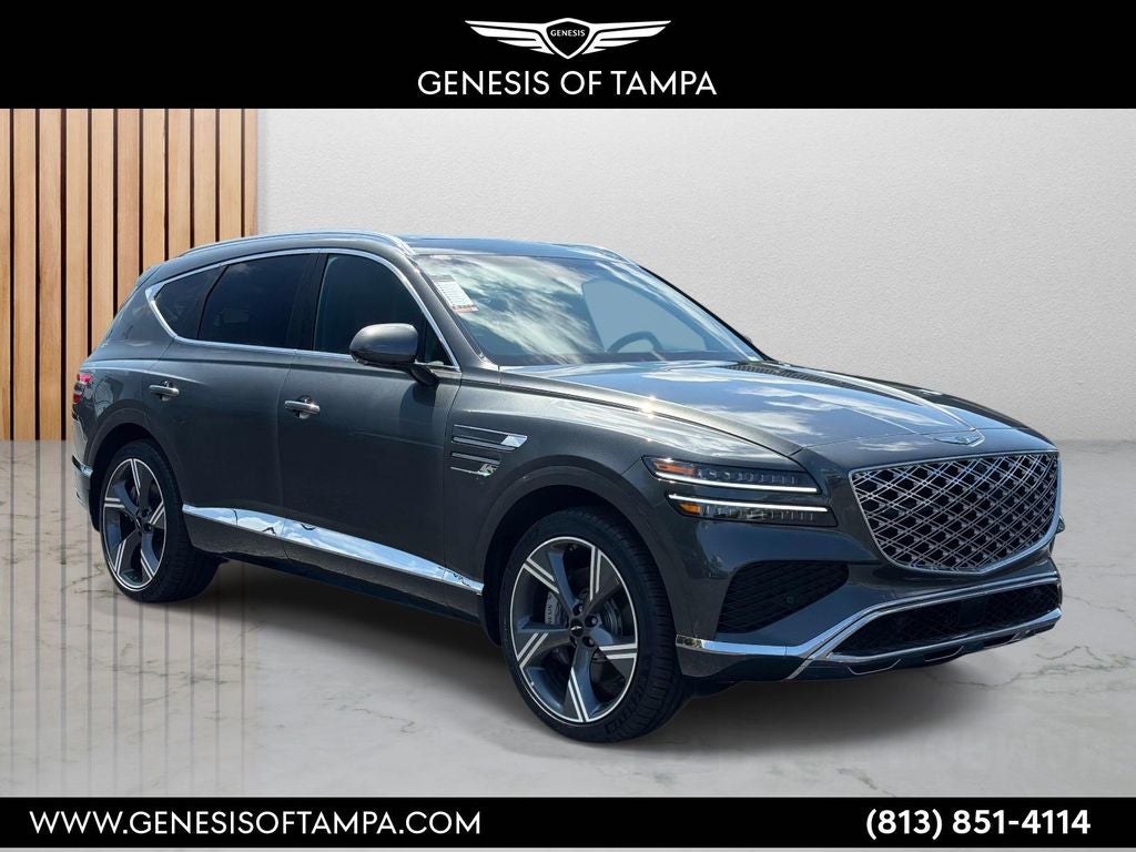 2026 Genesis GV80 3.5T Prestige in Makalu Gray — front three-quarter view